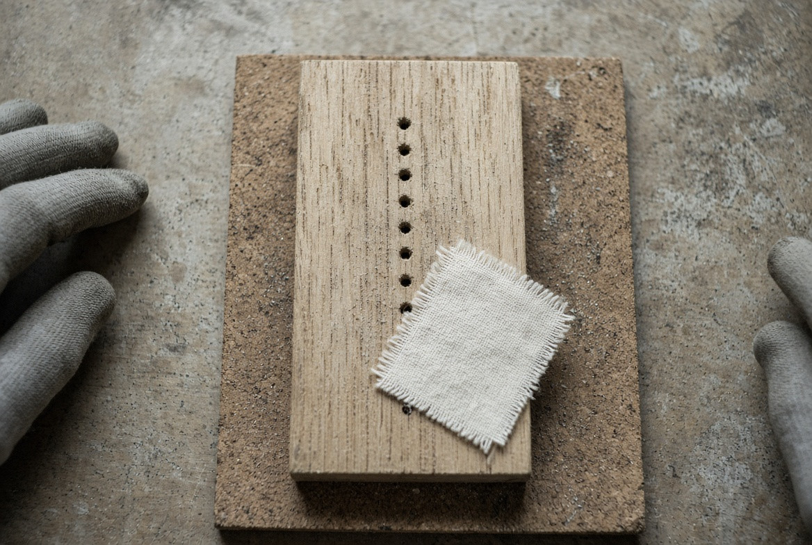 Replaceable date patch beside an unfilled contact stitch